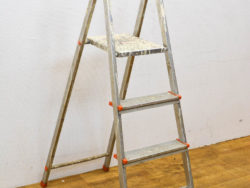 Sturdy aluminum ladder with non-slip steps, ideal for safe indoor and outdoor tasks.