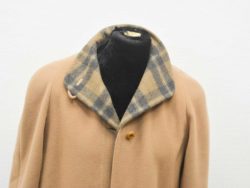 Stylish beige coat with plaid collar, size 40, perfect for any occasion.