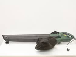 Efficient green leaf blower with collection bag and power cord, perfect for yard maintenance.