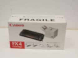 Canon FX4 cartridge box with fragile label for careful handling and reliable printing performance.