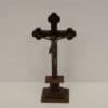 Elegant wooden crucifix with a detailed Jesus figure, perfect for devotion and decor.