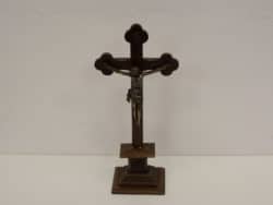 Elegant wooden crucifix with a detailed Jesus figure, perfect for devotion and decor.