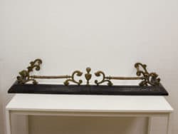 Elegant antique wooden and brass wall bracket, perfect for adding vintage charm to your space.