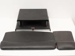 Sleek black ergonomic desk accessories for enhanced comfort and productivity during work.