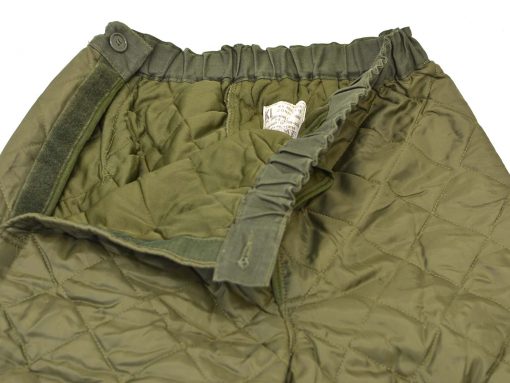 Olive green quilted pants for warmth and comfort in outdoor adventures.