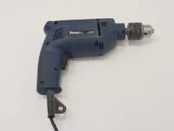 Ergonomic deep blue drill with keyless chuck, ideal for DIY and professional projects.