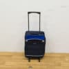 Stylish navy blue suitcase with practical features and smooth wheels for effortless travel.