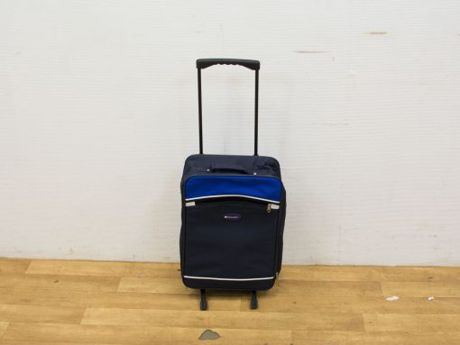 Stylish navy blue suitcase with practical features and smooth wheels for effortless travel.