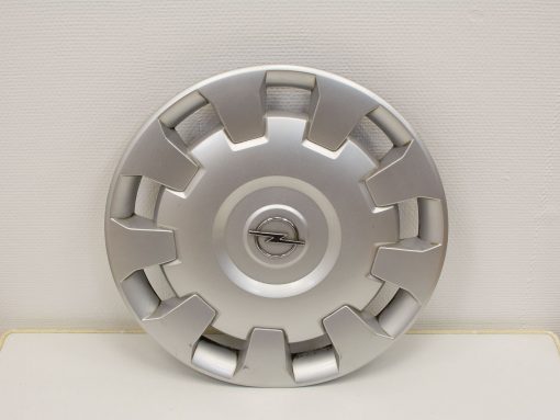 Sleek silver Opel hubcap with dynamic cutouts for improved airflow and modern style.