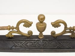 Elegant wooden curtain rod with gold accents and intricate carvings for sophisticated home decor.