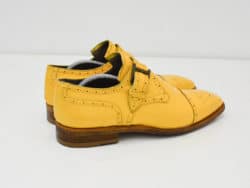 Vibrant yellow brogue oxfords, size 43, perfect for stylish casual or formal occasions.