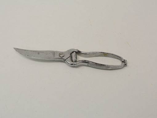 Vintage stainless steel kitchen scissors with ergonomic grips for precise and effortless cutting.