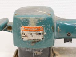 Vintage teal Black & Decker power tool, ergonomic design for reliable DIY projects and craftsmanship.