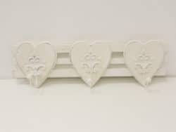 Charming heart-shaped wall hooks for elegant organization and vintage-inspired home decor.