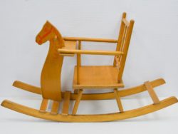 Charming vintage wooden rocking horse for safe, imaginative play and decorative nursery appeal.