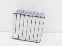 Set of 8 vintage cassette tapes, 60 minutes each, perfect for collectors and nostalgic music lovers.