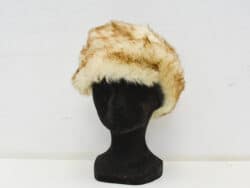 Chic vintage cream and brown faux fur hat for stylish winter warmth and elegance.