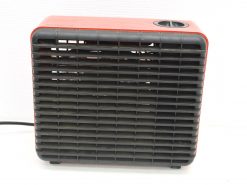 Stylish black and red compact electric heater for efficient heating in small spaces.