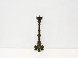 Elegant brass oil lamp with intricate design, perfect for vintage decor and ambiance.