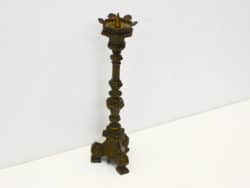 Intricately designed bronzed candle holder, perfect for adding elegance to any space.