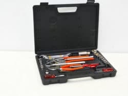 Versatile black toolkit with vibrant orange handles, designed for professionals and DIY projects.