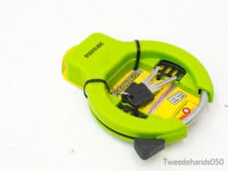 Bright green keychain measuring tape, perfect for precise measurements in any setting.