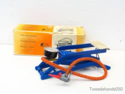 Vintage blue foot pump with orange hose, perfect for inflating bicycles and sports equipment.