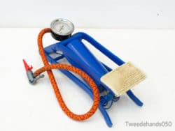 Bright blue foot pump with pressure gauge and flexible hose for easy inflation of sports gear.