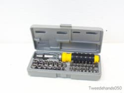 Ergonomic screwdriver and durable socket set in a portable case for efficient DIY tasks.