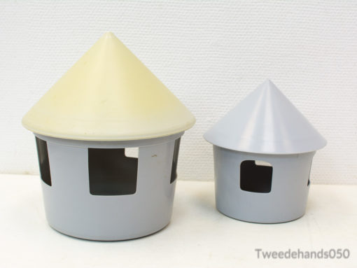 Charming gray toy houses with cheerful yellow roofs, perfect for inspiring childrens creativity.