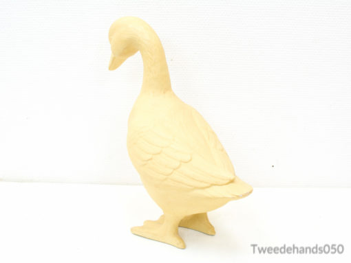 Charming beige ceramic goose figurine, perfect for rustic home decor and DIY projects.