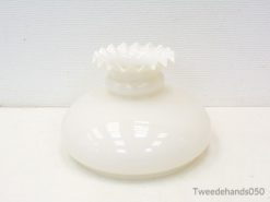 Timeless vintage white vase with a scalloped edge, ideal for elegant floral displays.