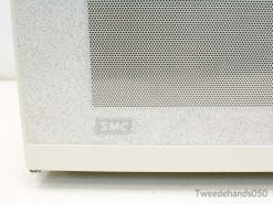 SMC microwave with textured finish and efficient ventilation for contemporary kitchen designs.