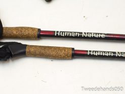 Stylish Human Nature trekking poles with comfortable cork grips for your outdoor adventures.