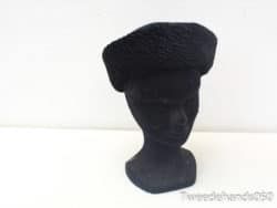 Elegant vintage black hat with wavy texture, perfect for making a stylish statement.