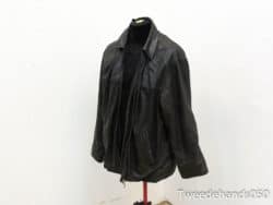 Chic black leather jacket for versatile casual and semi-formal wear, blending style and comfort.