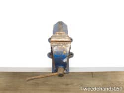 Durable vintage blue vise, perfect for woodworking and metalworking tasks in any workshop.