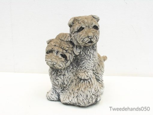 Adorable terrier sculpture showcasing friendship, ideal decor for dog lovers and pet enthusiasts.