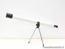 Sleek white telescope on sturdy tripod, ideal for beginners and amateur stargazers.