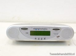 Sleek digital clock radio with bright LCD display and user-friendly controls for audio enjoyment.