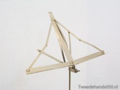 Antique drafting tripod for precise architectural and design projects, combining elegance and functionality.