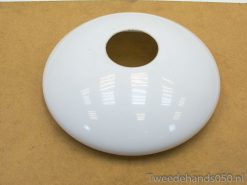 Sleek white ceramic disc with central opening, ideal for modern decor and lighting accents.