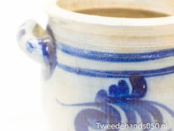 Handcrafted ceramic jar with blue decor, ideal for both decorative display and storage.