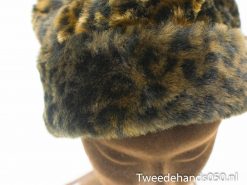 Chic leopard print faux fur hat for luxurious warmth and style this winter.