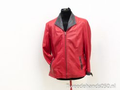 Vibrant red leather jacket for women with chic black accents and a flattering silhouette.