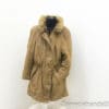 Chic brown vintage coat with faux fur collar, ideal for stylish winter outfits.