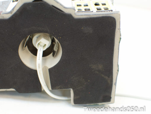 Vintage appliance base with textured gray finish and white power cord, ideal for daily use.