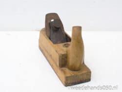 Vintage wooden hand plane for woodworking, showcasing craftsmanship and traditional design.