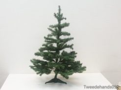 Versatile artificial Christmas tree for joyful holiday decorating and festive tabletop displays.