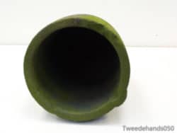 Vintage green cylindrical pot with unique gradient, adding rustic charm and character to any decor.